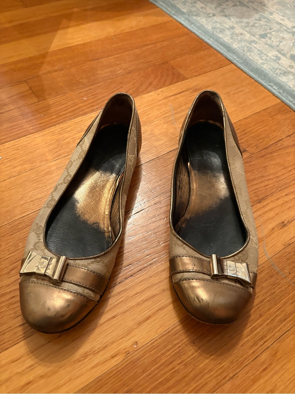 Gucci Metallic Bronze Ballet Flats with Bow Accent